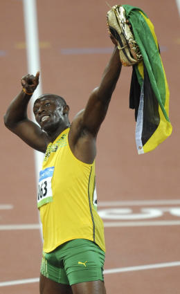 Olympics:  Like a Bolt of Lightening Olympic Champion Usain Bolt breaks Micheal Johnson’s Record